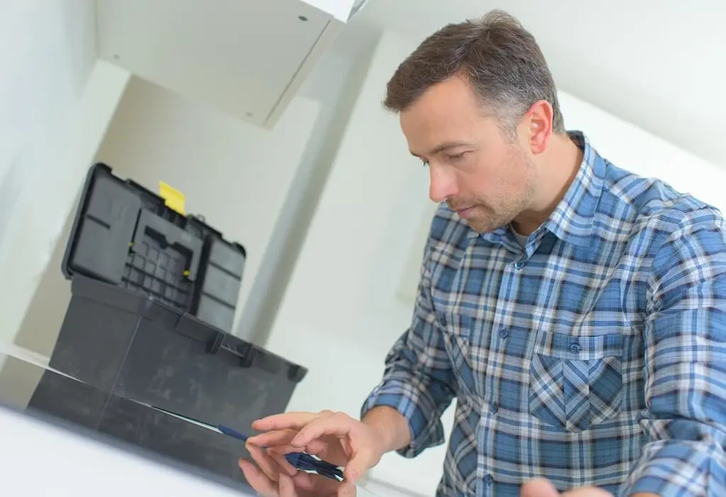 tradesperson with electric hob