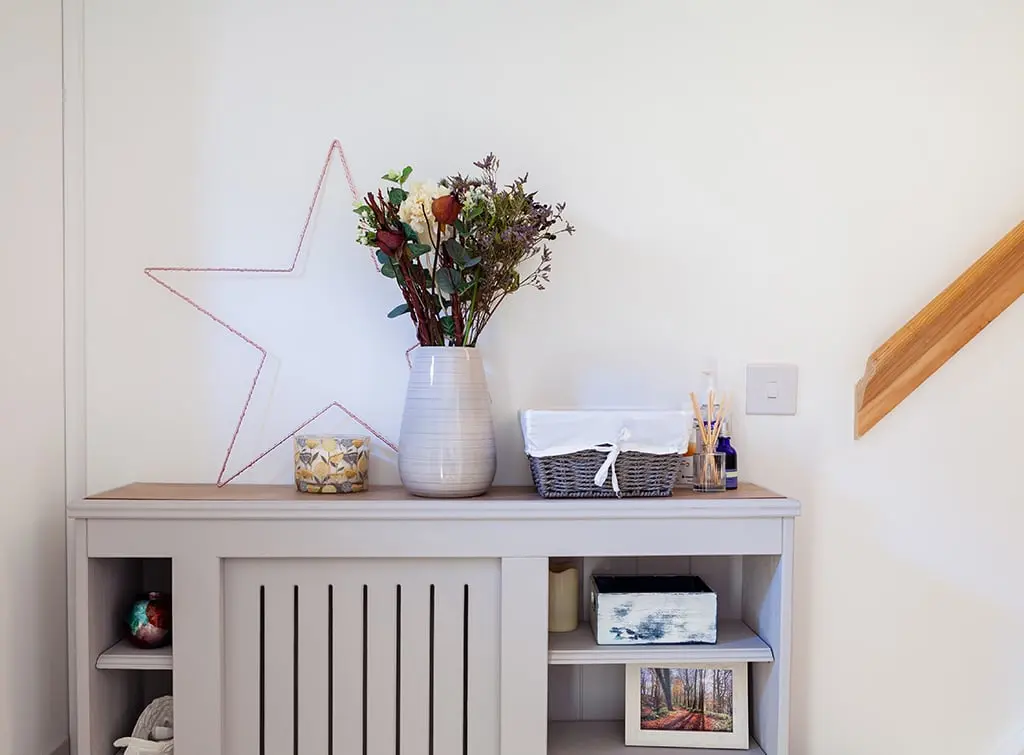 max out storage with a radiator cover with shelf