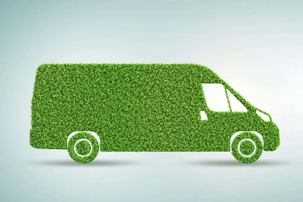 work van decaled in grass - the eco van