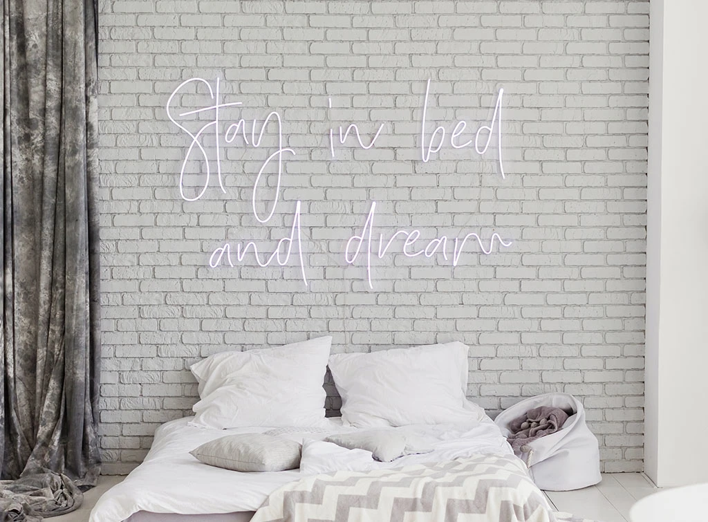 neon sign in grey bedroom