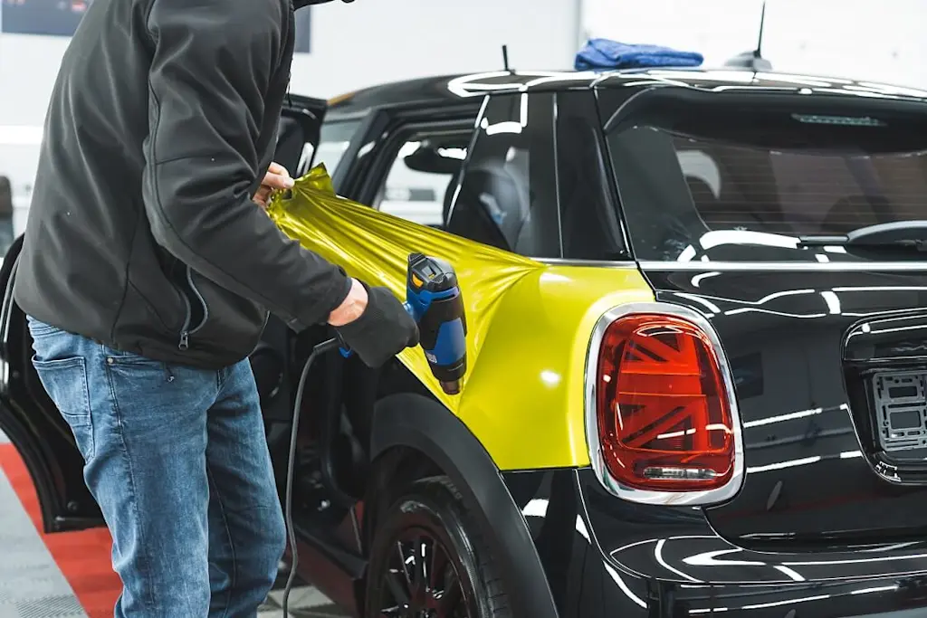 applying auto wrap to car