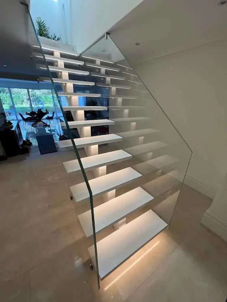 Floating metal stairs with glass