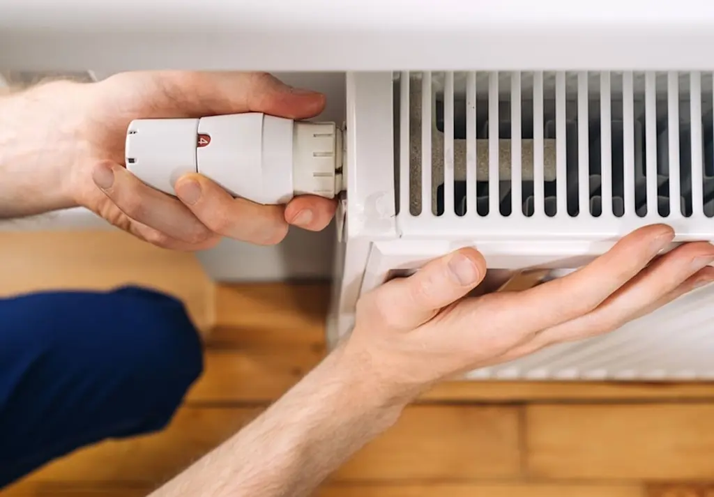 Checking warmth of radiator