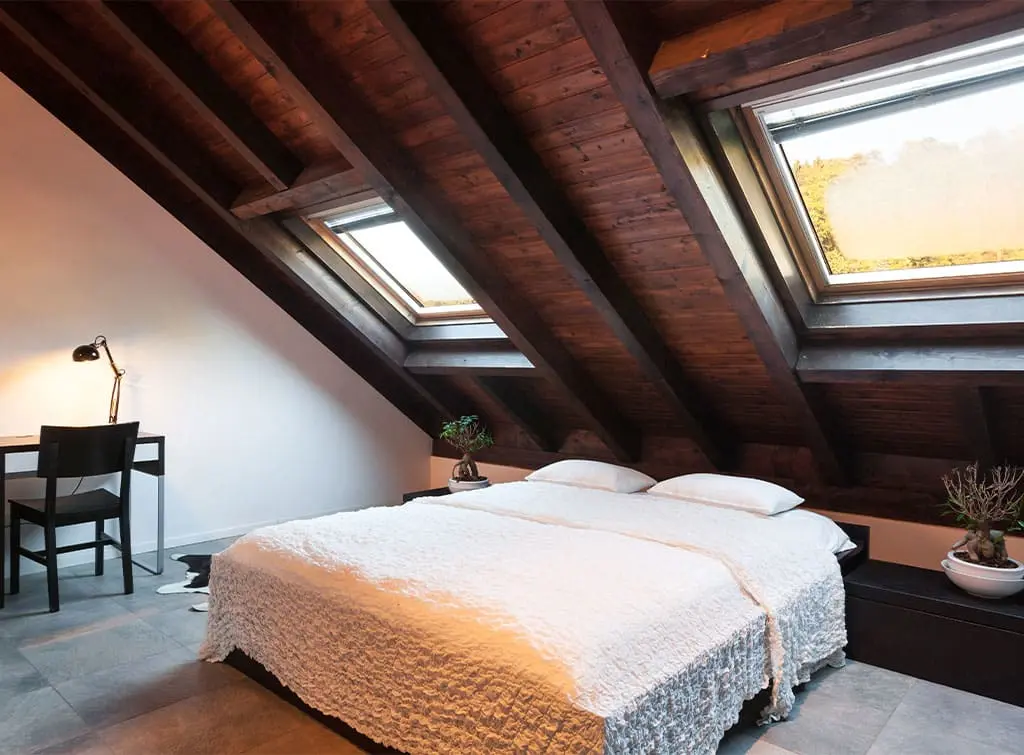 https://www.checkatrade.com/blog/wp-content/uploads/2023/07/Loft-room-ideas-embracing-architecture.jpg