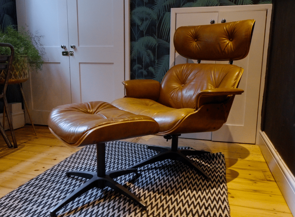 In a modern home, introduce iconic midcentury pieces, such as this Eames lounge chair and Ottoman