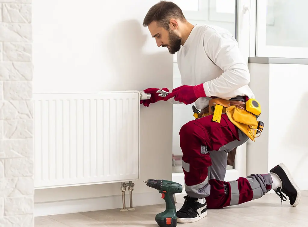 https://www.checkatrade.com/blog/wp-content/uploads/2023/10/heating-engineer-tools.jpg