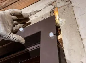 carpenter fitting door frame 