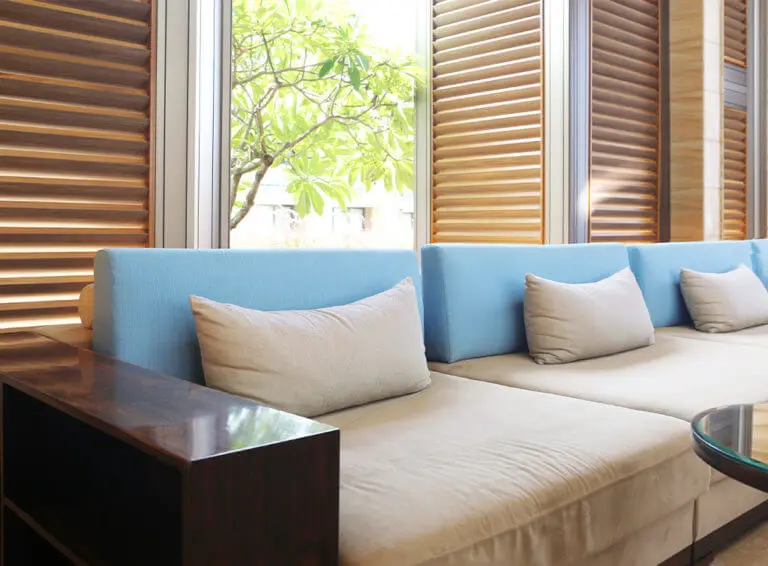Modern living room with window shutters cost
