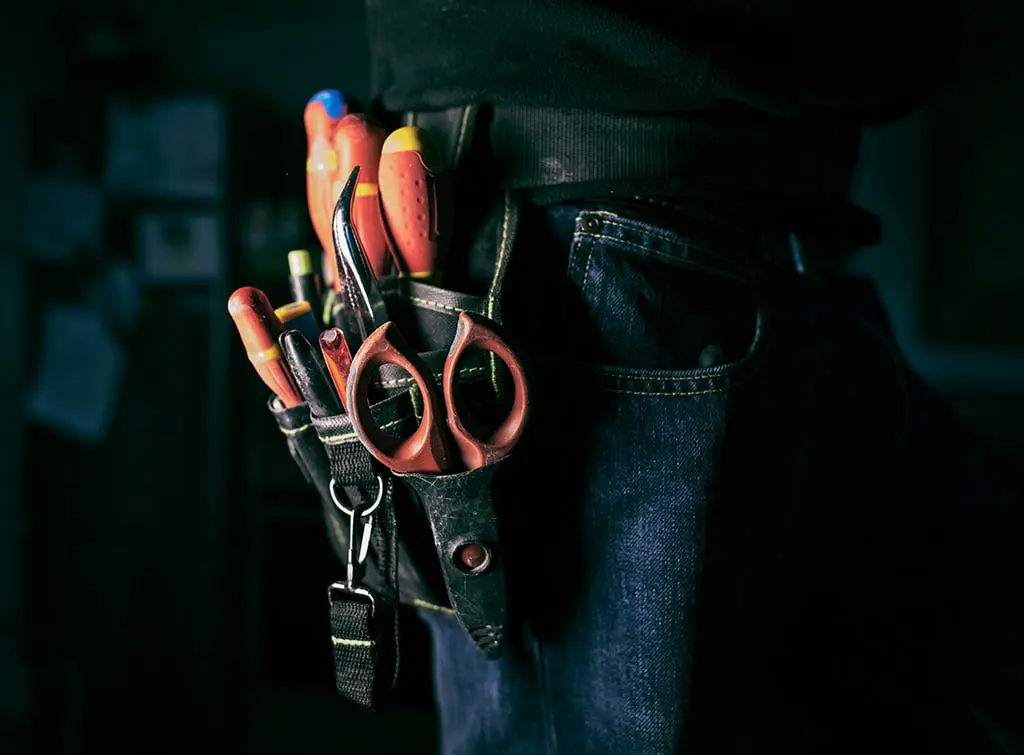 https://www.checkatrade.com/blog/wp-content/uploads/2023/08/Electrician-trousers.jpg