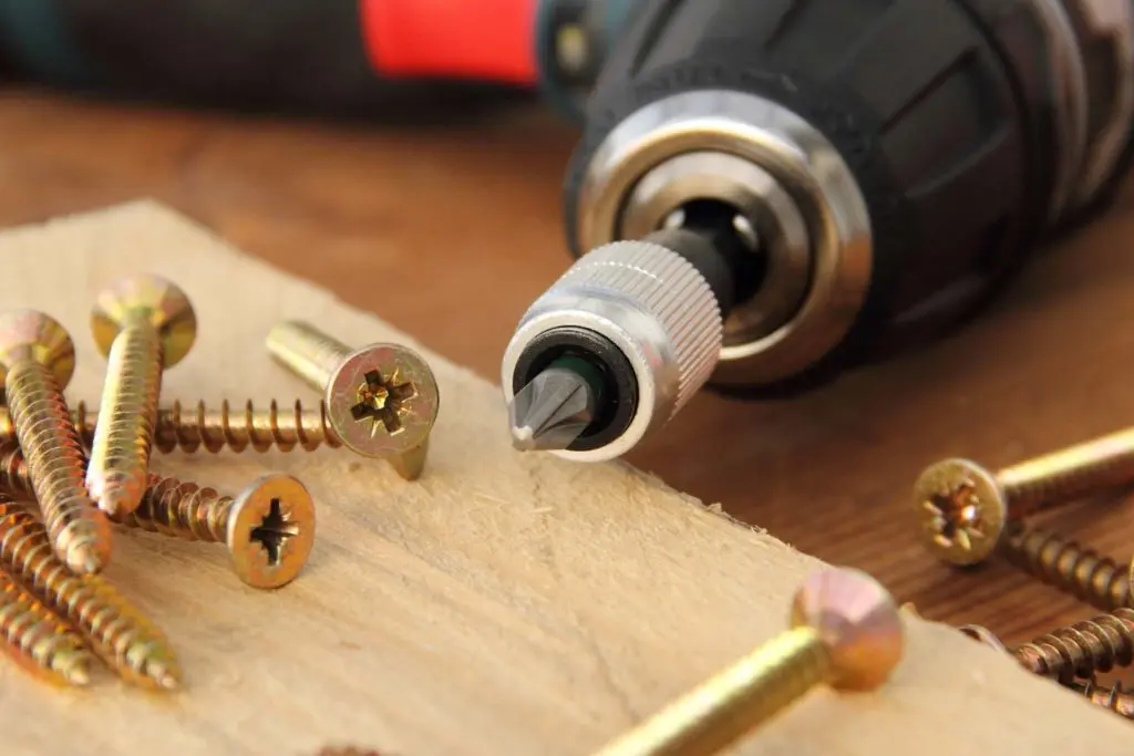 cordless combi drill laying on a workbench