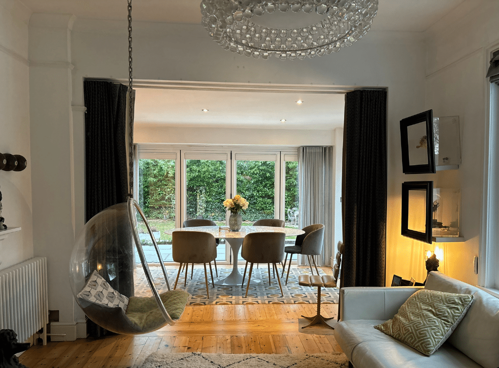 Retro bubble hanging chair in a modern living room