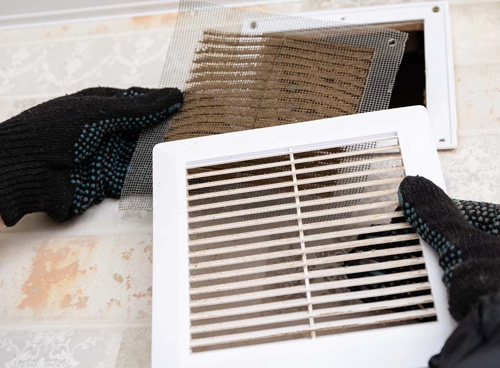 How do you unblock a bathroom extractor fan