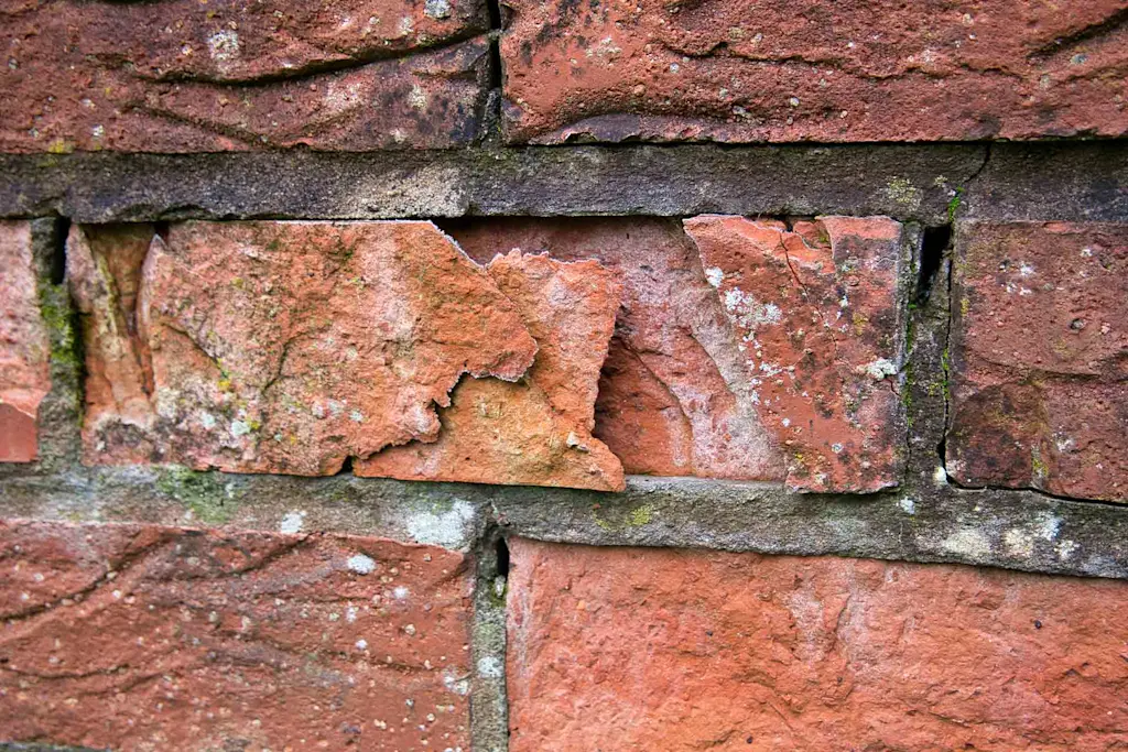 Damaged brickwork and pointing