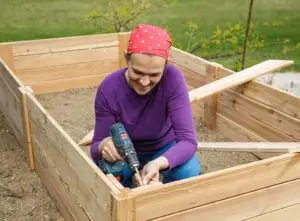 how to build a raised bed with railway sleepers