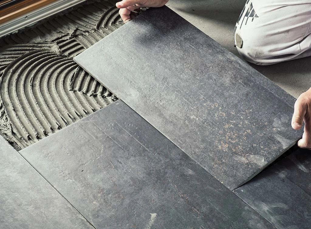 https://www.checkatrade.com/blog/wp-content/uploads/2023/12/How-to-become-a-tiler-Image-2.jpg