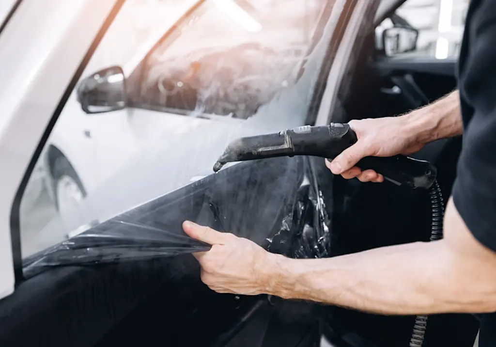 Steaming for window tint