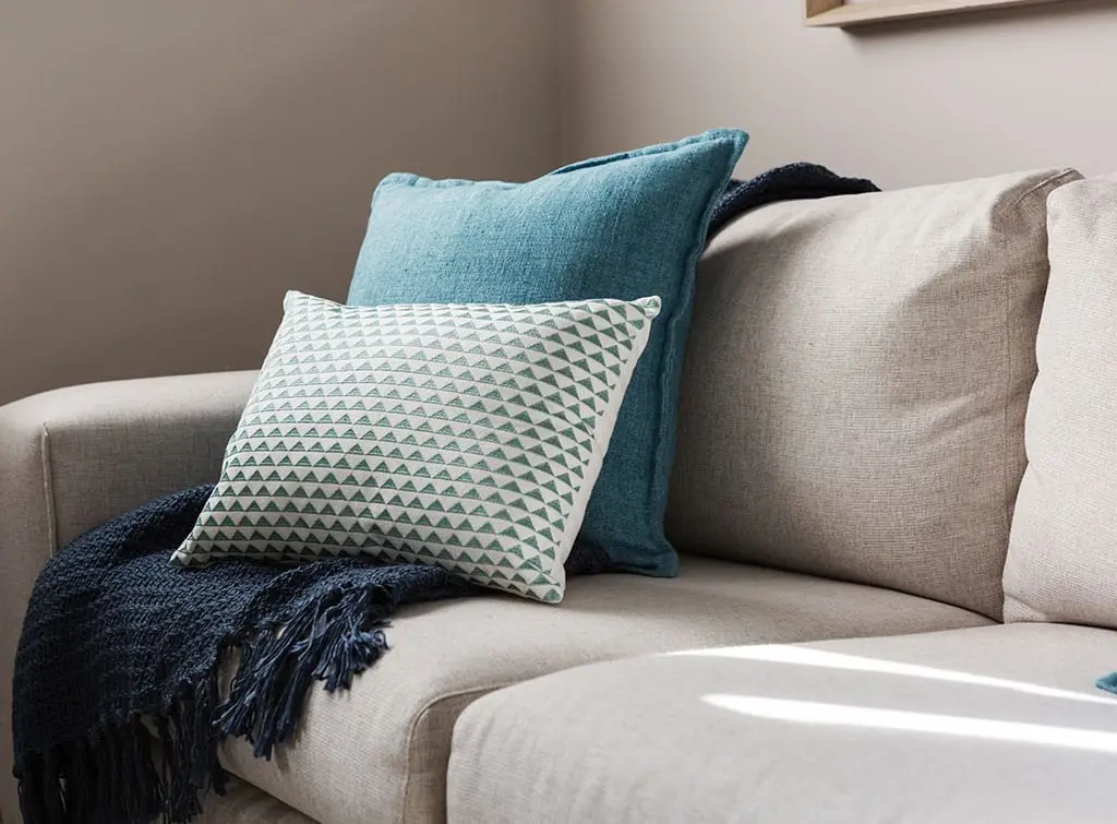 teal accessories in living room