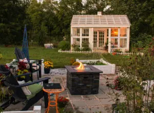 https://www.checkatrade.com/blog/wp-content/uploads/2020/07/Garden-fire-pit-installation-3-300x221.jpg