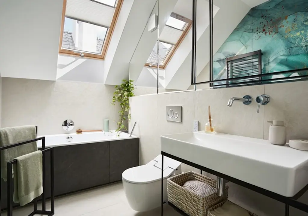 Small ensuite loft bathroom with natural light