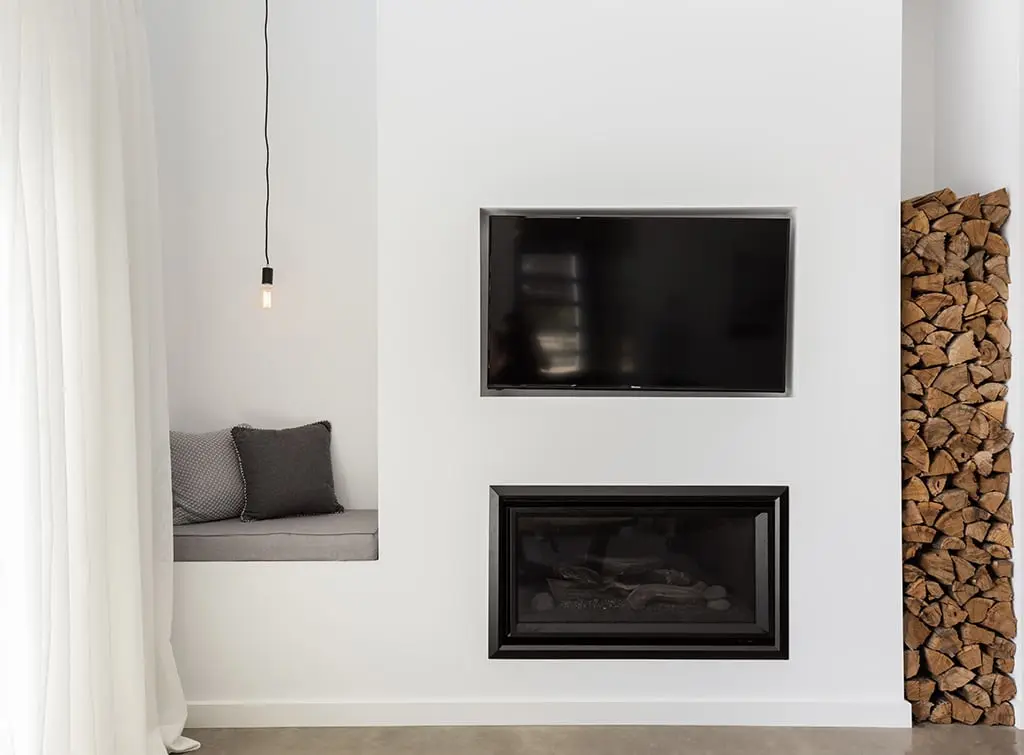 Firewood store in an alcove