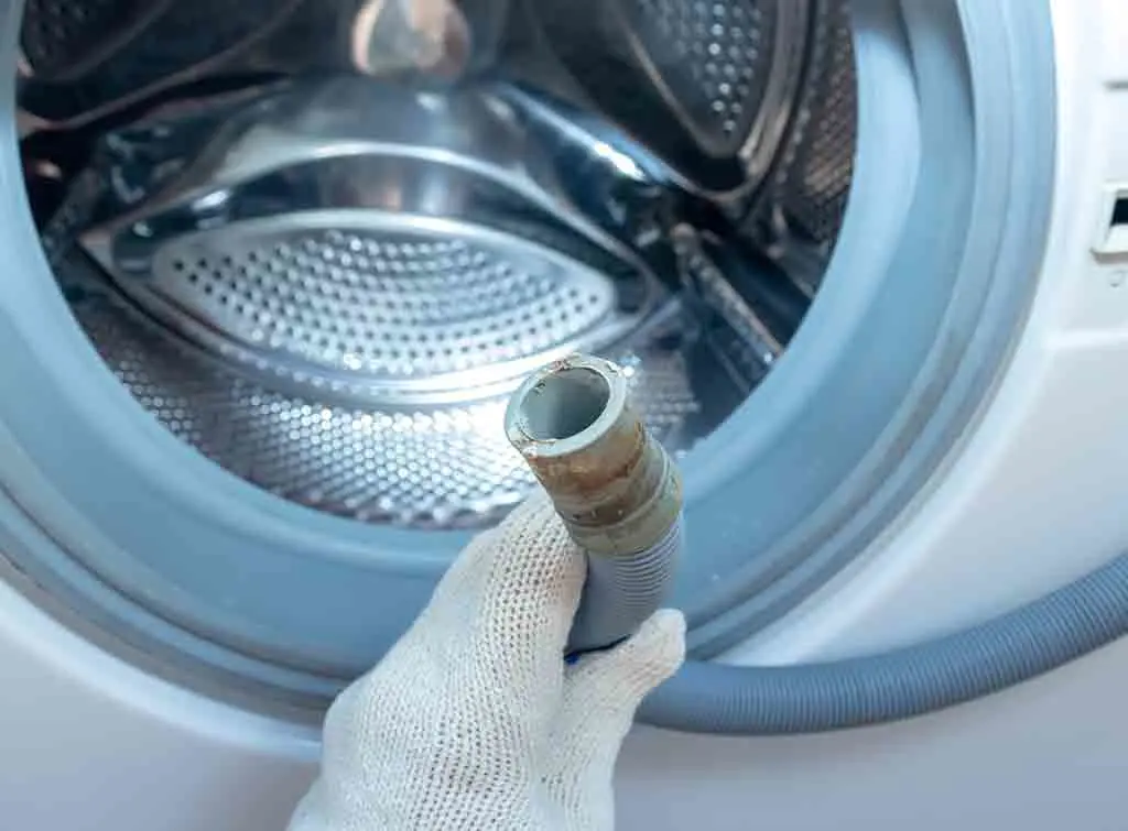 disconnected washing machine pipe