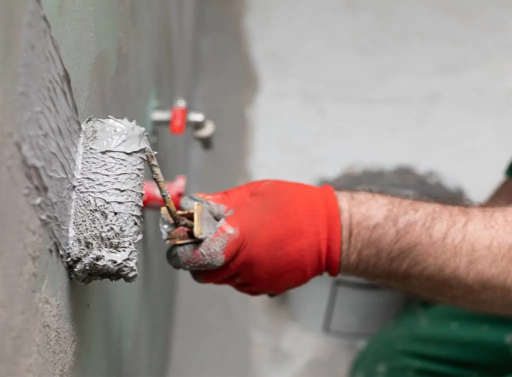 https://www.checkatrade.com/blog/wp-content/uploads/2021/06/external-rising-damp-treatment.jpg