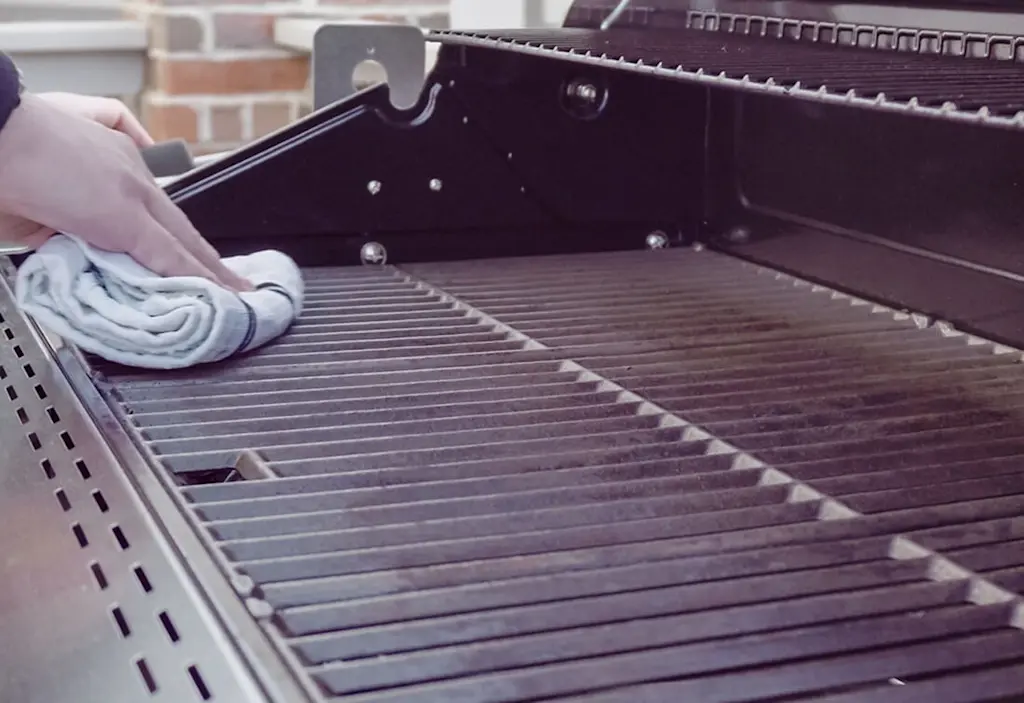 Wiping down grill after steaming