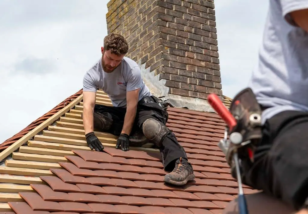 Man roofing to become a roofer by trade