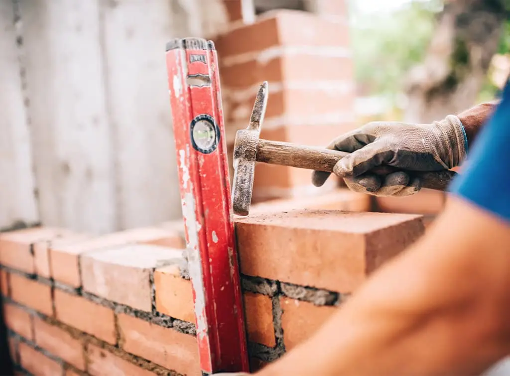Brick wall being built