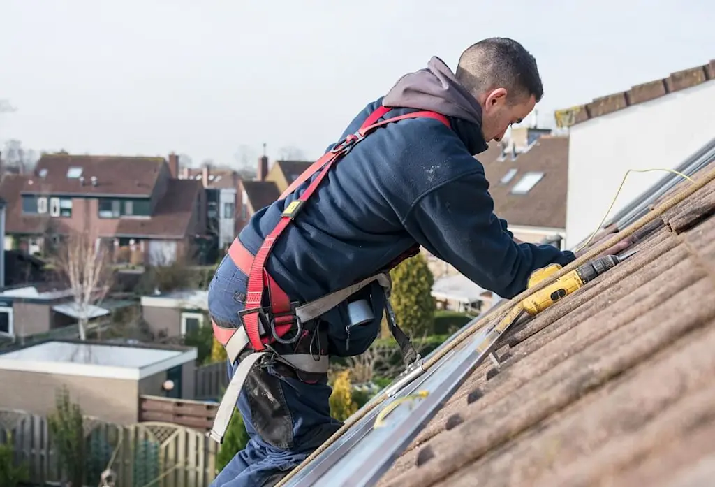carrying out roofing repairs