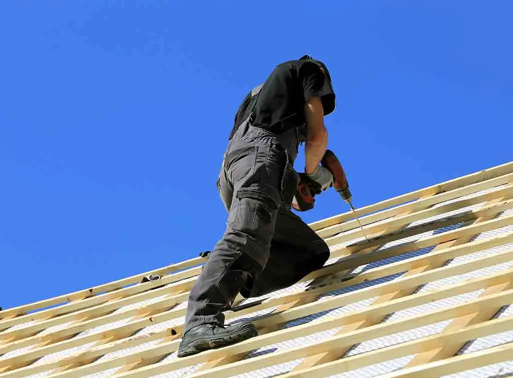 https://www.checkatrade.com/blog/wp-content/uploads/2023/07/Carrying-out-roofing-work.jpg