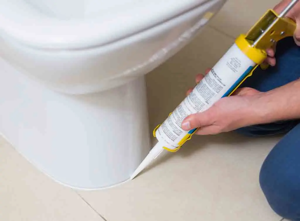 Sealing toilet leaking at waste pipe 