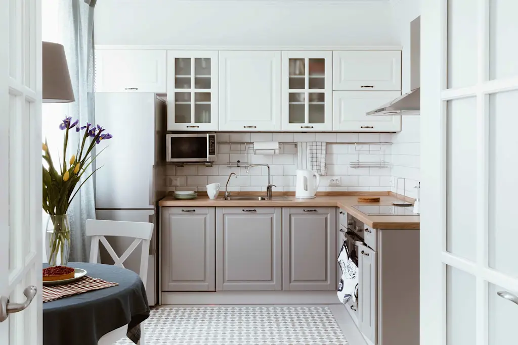 use darker colours on the base units for small kitchen ideas