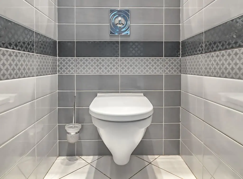 Grey tiled downstairs cloakroom
