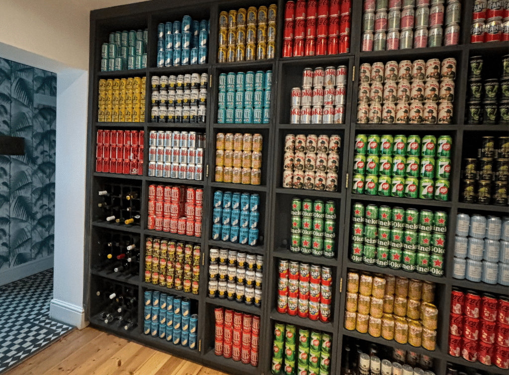 Floor to ceiling shelving doubles as the entrance to a secret room