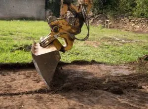 How to get rid of topsoil with a tractor