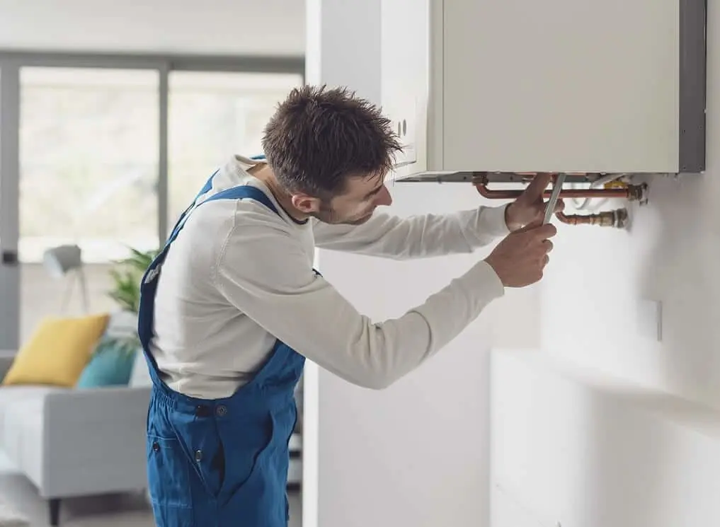 https://www.checkatrade.com/blog/wp-content/uploads/2024/10/boiler-condensate-pipe-regulations-ask-trade-1.jpeg