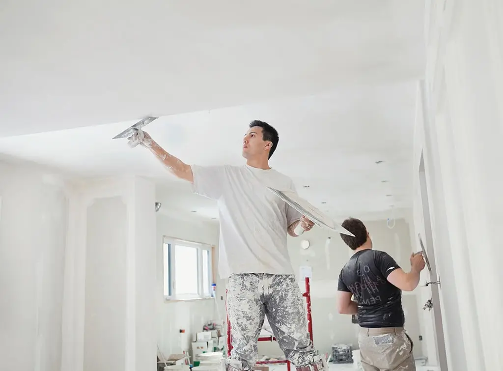 https://www.checkatrade.com/blog/wp-content/uploads/2024/09/Do-you-need-plasterer-insurance-ceiilng.jpg