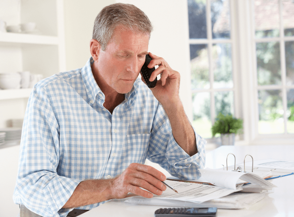 https://www.checkatrade.com/blog/wp-content/uploads/2024/09/paying-invoice-for-cleaning-services.png