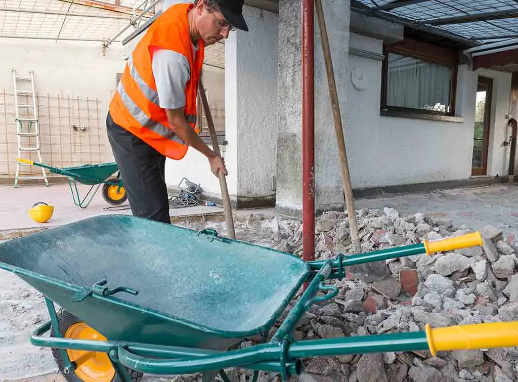 builder getting rid of rubble