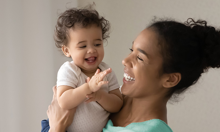 Baby laughing at cheap 2 months