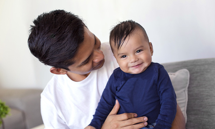 hispanic family with baby