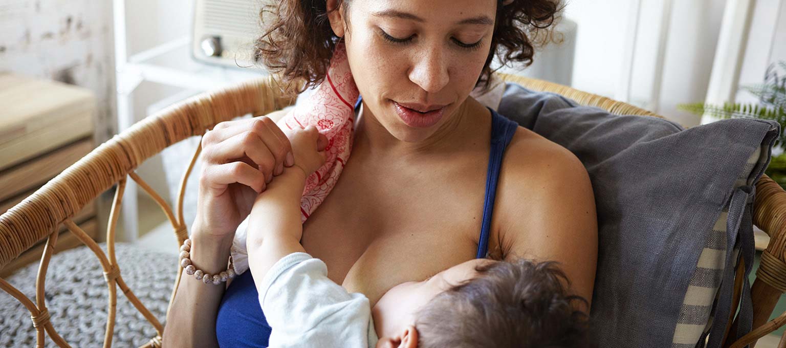 Give breast milk or solids first?
