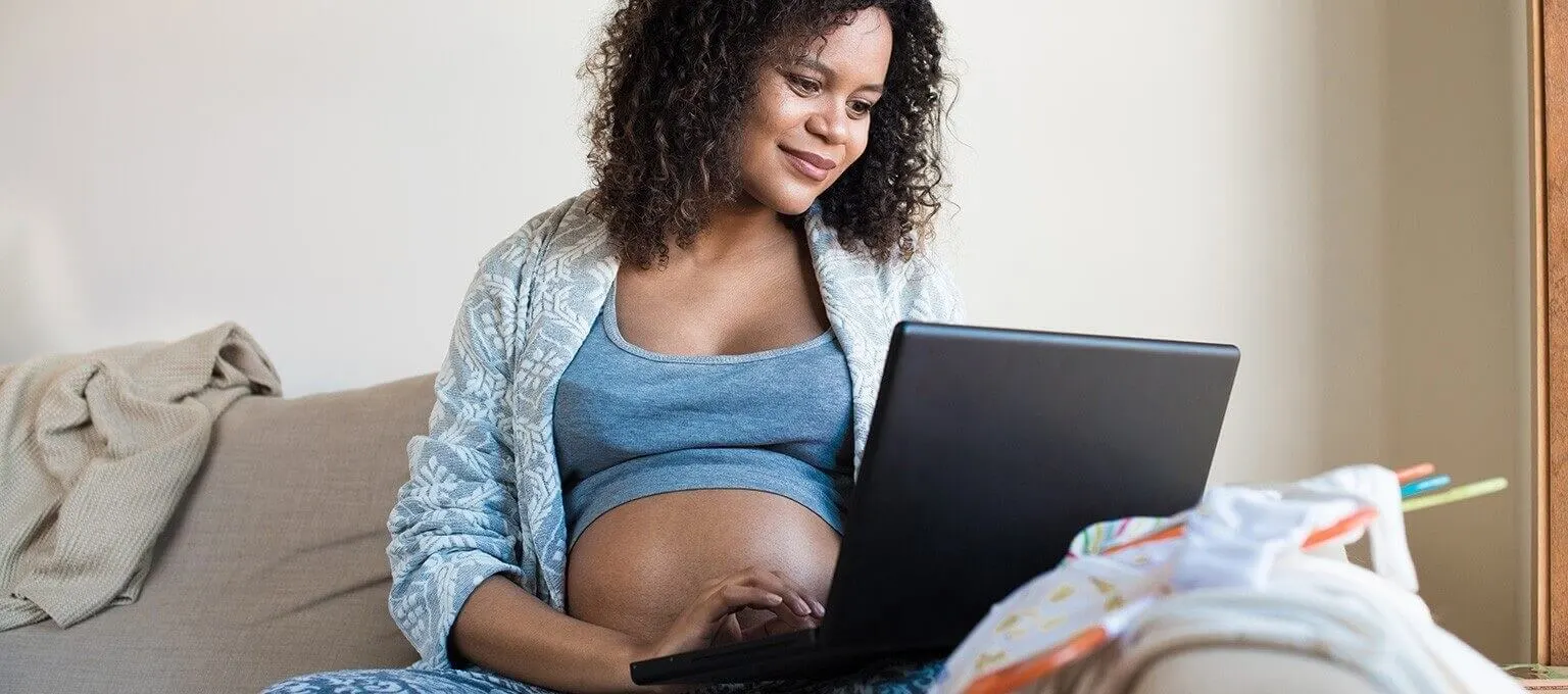 Pregnant woman looking at birth plan
