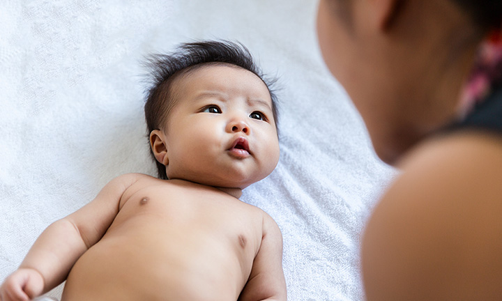 Tummy time mom with baby