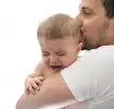 Baby crying with dad
