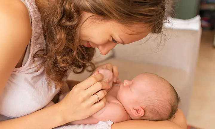 Breasts are made for feeding. New dads play a key role in