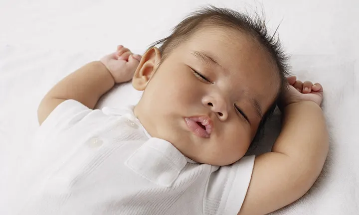 Baby sleeping on stomach