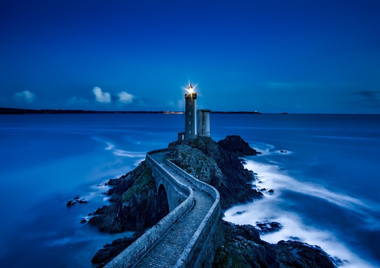 Lighthouse and concrete path