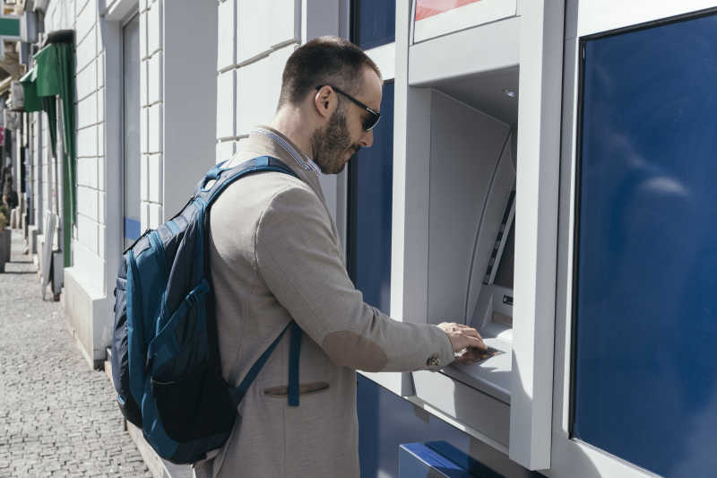 man-using-atm